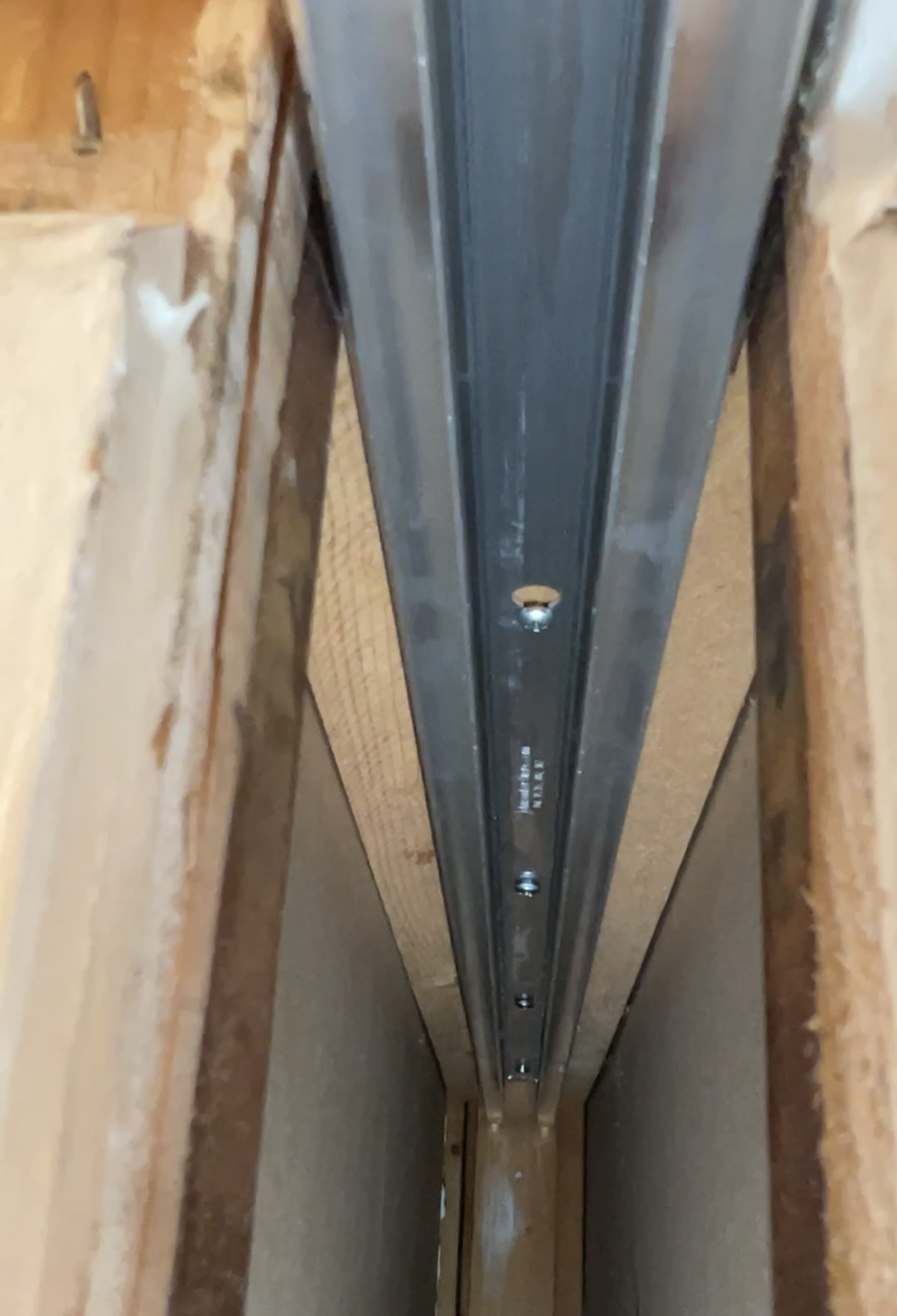 Pocket door track and header installed by Bayfront